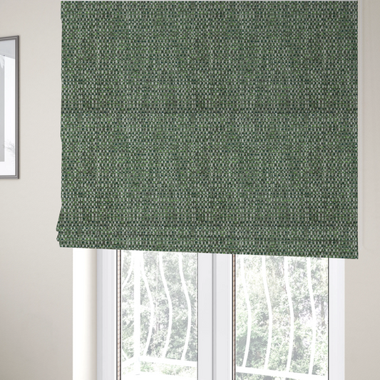 The fabric used to create these Roman blinds is a material features a dense, multi-toned green tweed pattern, intricately interlaced with small flecks of white, bright lime green, and dark brown threads throughout.