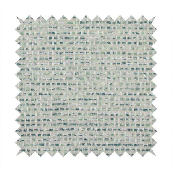 The material features a dense, multi-toned weave with a light cream or off-white background, intricately interlaced with horizontal flecks of teal, mint green, and soft grey threads throughout.
