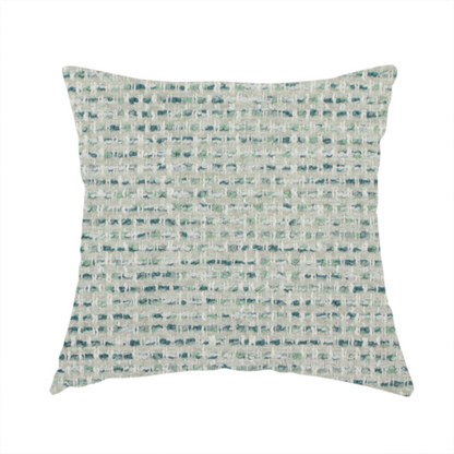 The fabric used to create this handmade cushion is a material features a dense, multi-toned weave with a light cream or off-white background, intricately interlaced with horizontal flecks of teal, mint green, and soft grey threads throughout.