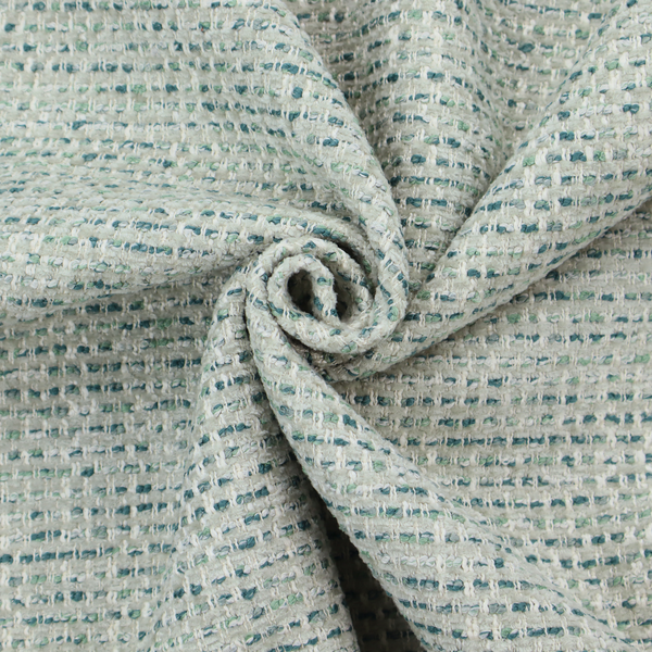 The material features a dense, multi-toned weave with a light cream or off-white background, intricately interlaced with horizontal flecks of teal, mint green, and soft grey threads throughout.