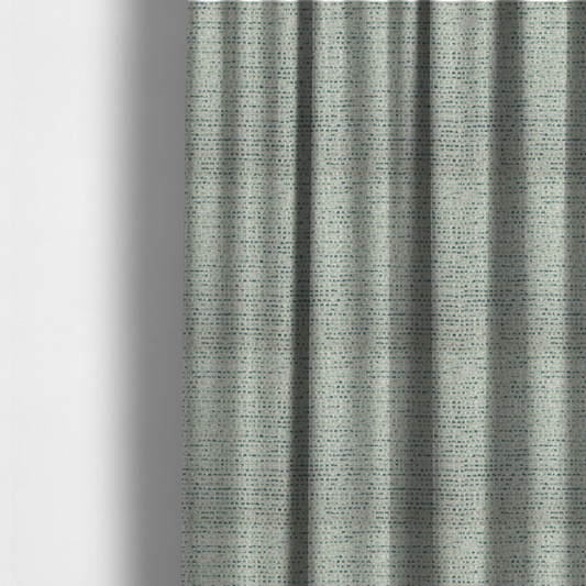 The fabric used to create these made-to-measure curtains is a  material features a dense, multi-toned weave with a light cream or off-white background, intricately interlaced with horizontal flecks of teal, mint green, and soft grey threads throughout.