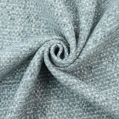 The material features a dense, multi-toned weave with a soft duck egg blue and sage green base, intricately interlaced with horizontal flecks of cream and muted slate grey threads throughout.