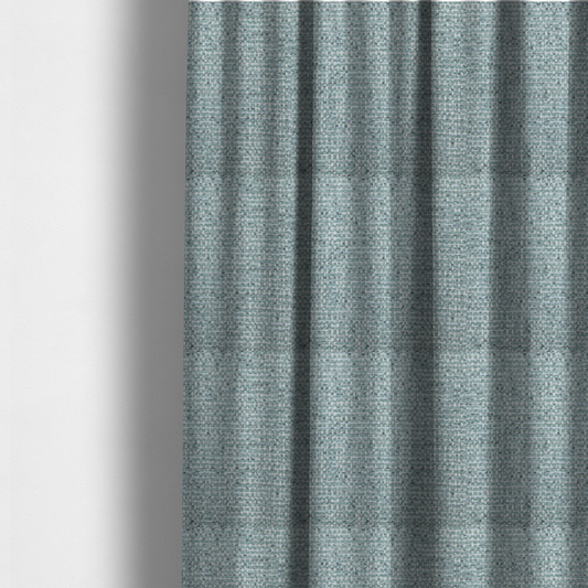 The fabric used to create these made-to-measure curtains is a material features a dense, multi-toned weave with a soft duck egg blue and sage green base, intricately interlaced with horizontal flecks of cream and muted slate grey threads throughout.