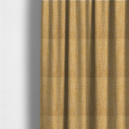 The fabric used to create these made-to-measure curtains is a material features a dense, multi-toned weave with a warm mustard yellow and ochre base, intricately interlaced with horizontal flecks of crisp white and soft beige threads throughout.