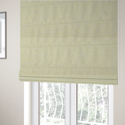 The fabric used to create these Roman blinds is a material features a dense, light-toned weave with a pale cream base, subtly interlaced with horizontal flecks of soft pastel yellow and light beige threads throughout.