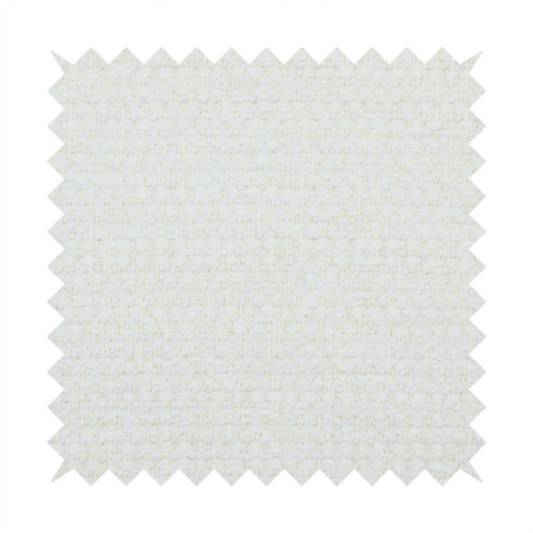 The material features a dense, minimalist weave in a uniform bright cream or off-white colour, highlighting the subtle horizontal texture of the interlaced threads.