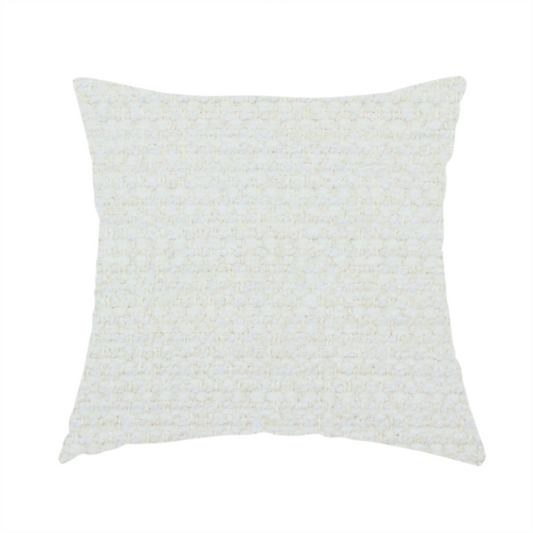 The fabric used to create this handmade cushion is a material features a dense, minimalist weave in a uniform bright cream or off-white colour, highlighting the subtle horizontal texture of the interlaced threads.