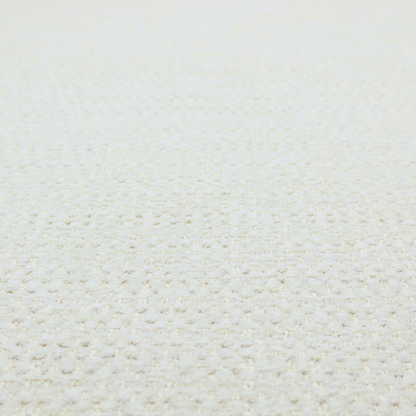 The material features a dense, minimalist weave in a uniform bright cream or off-white colour, highlighting the subtle horizontal texture of the interlaced threads.
