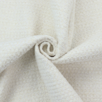 The material features a dense, minimalist weave in a uniform bright cream or off-white colour, highlighting the subtle horizontal texture of the interlaced threads.