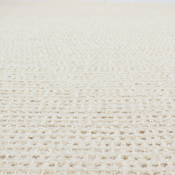 The material features a dense, neutral weave with a light cream base, subtly interlaced with horizontal flecks of soft beige and oatmeal-coloured threads throughout.
