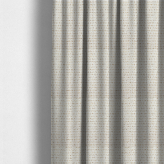 The fabric used to create these made-to-measure curtains is a material features a dense, neutral weave with a light cream base, subtly interlaced with horizontal flecks of soft beige and oatmeal-coloured threads throughout.