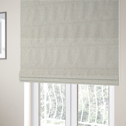 The fabric used to create these Roman blinds is a material features a dense, neutral weave with a light cream base, subtly interlaced with horizontal flecks of soft beige and oatmeal-coloured threads throughout.