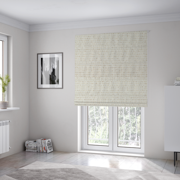 The fabric used to create these Roman blinds is a material features a dense, neutral weave with a light cream base, subtly interlaced with horizontal flecks of soft beige and oatmeal-coloured threads throughout.