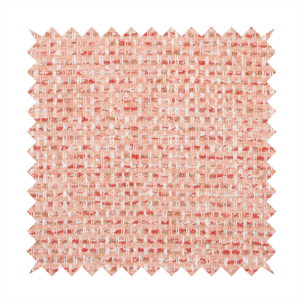 The material features a dense, warm-toned weave with a soft coral pink and peach base, intricately interlaced with horizontal flecks of terracotta red, beige, and white threads throughout.