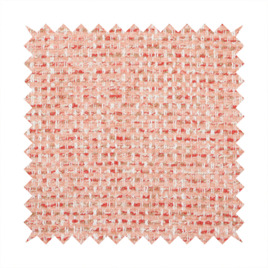 The material features a dense, warm-toned weave with a soft coral pink and peach base, intricately interlaced with horizontal flecks of terracotta red, beige, and white threads throughout.