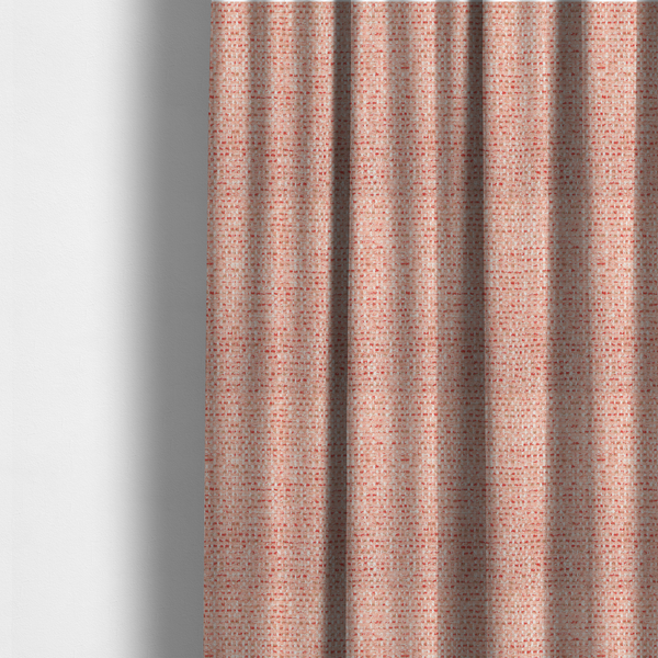 The fabric used to create these made-to-measure curtains is a material features a dense, warm-toned weave with a soft coral pink and peach base, intricately interlaced with horizontal flecks of terracotta red, beige, and white threads throughout.
