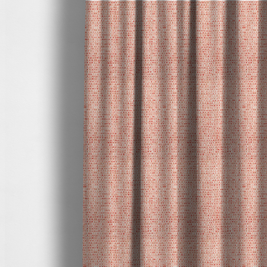 The fabric used to create these made-to-measure curtains is a material features a dense, warm-toned weave with a soft coral pink and peach base, intricately interlaced with horizontal flecks of terracotta red, beige, and white threads throughout.
