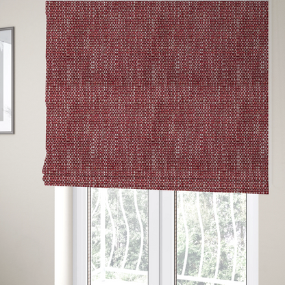 The fabric used to create these Roman blinds is a material features a dense, multi-toned weave with a deep burgundy and rich red base, intricately interlaced with prominent horizontal flecks of crisp white and soft brown threads throughout.