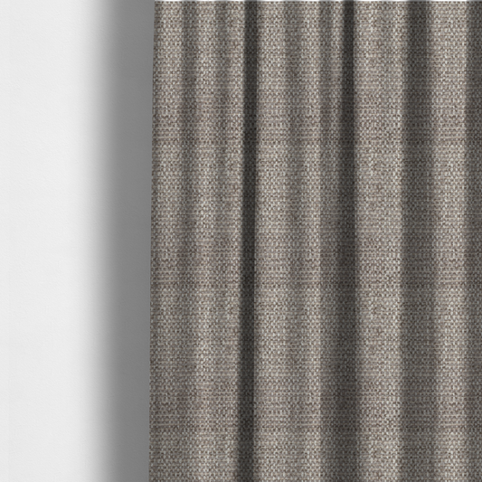 The fabric used to create this handmade cushion is a material features a dense, multi-toned weave with a cool taupe and light brown base, intricately interlaced with horizontal flecks of cream and off-white threads throughout.