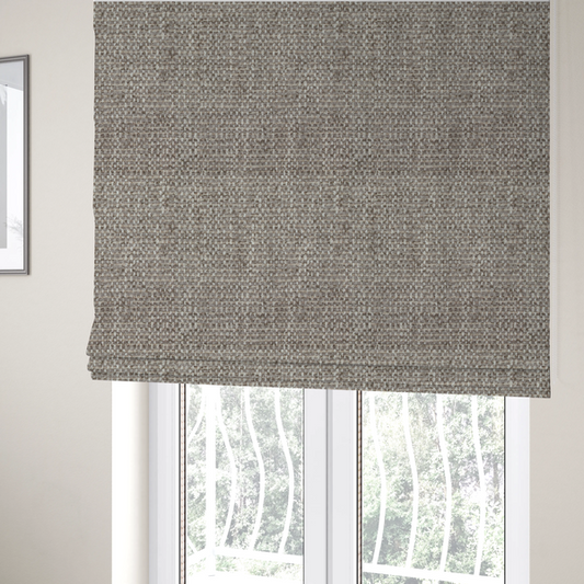 The fabric used to create these Roman blinds is a material features a dense, multi-toned weave with a cool taupe and light brown base, intricately interlaced with horizontal flecks of cream and off-white threads throughout