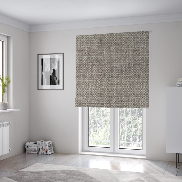 The fabric used to create these Roman blinds is a material features a dense, multi-toned weave with a cool taupe and light brown base, intricately interlaced with horizontal flecks of cream and off-white threads throughout