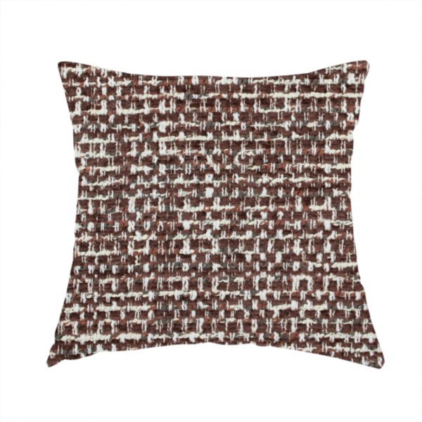 The fabric used to create this handmade cushion is a material features a dense, multi-toned weave with a deep chocolate brown base, intricately interlaced with prominent horizontal flecks of crisp white and dark charcoal grey threads throughout.