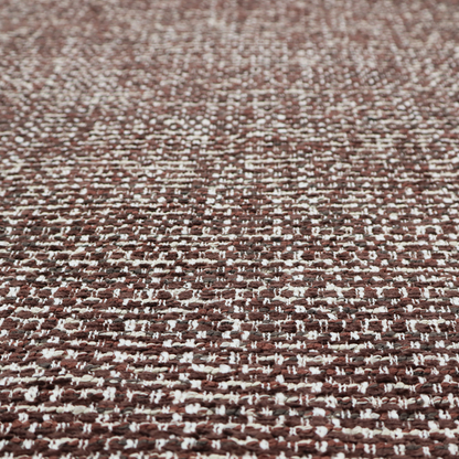 The material features a dense, multi-toned weave with a deep chocolate brown base, intricately interlaced with prominent horizontal flecks of crisp white and dark charcoal grey threads throughout.