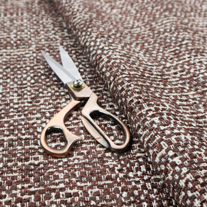 The material features a dense, multi-toned weave with a deep chocolate brown base, intricately interlaced with prominent horizontal flecks of crisp white and dark charcoal grey threads throughout.