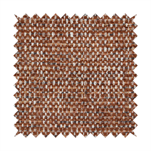 The material features a dense, multi-toned weave with a warm rust orange and terracotta base, intricately interlaced with prominent horizontal flecks of crisp white and dark charcoal brown threads throughout.