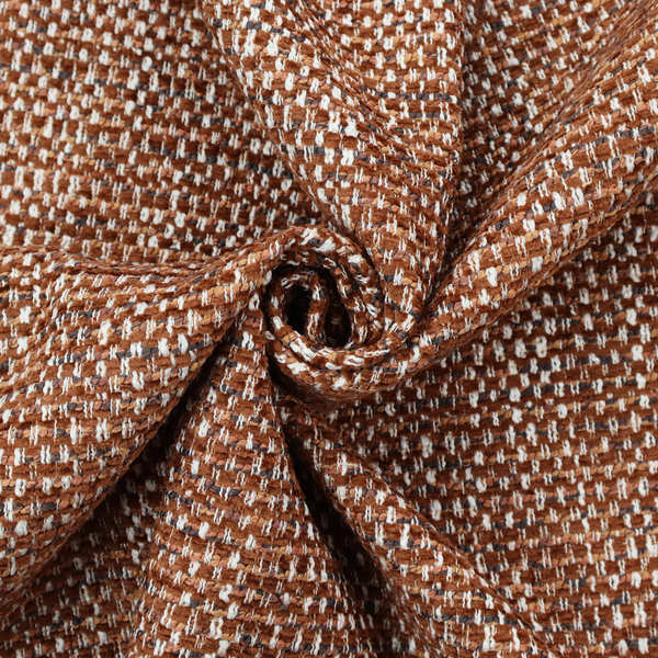 The material features a dense, multi-toned weave with a warm rust orange and terracotta base, intricately interlaced with prominent horizontal flecks of crisp white and dark charcoal brown threads throughout.