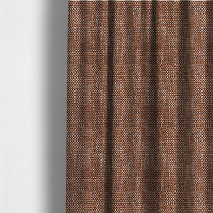 The fabric used to create these made-to-measure curtains is a material features a dense, multi-toned weave with a warm rust orange and terracotta base, intricately interlaced with prominent horizontal flecks of crisp white and dark charcoal brown threads throughout.