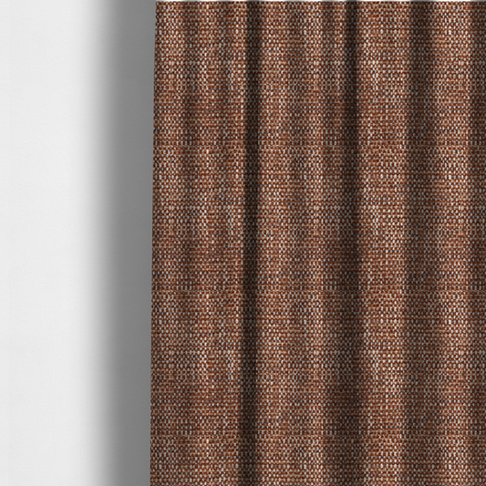 The fabric used to create these made-to-measure curtains is a material features a dense, multi-toned weave with a warm rust orange and terracotta base, intricately interlaced with prominent horizontal flecks of crisp white and dark charcoal brown threads throughout.