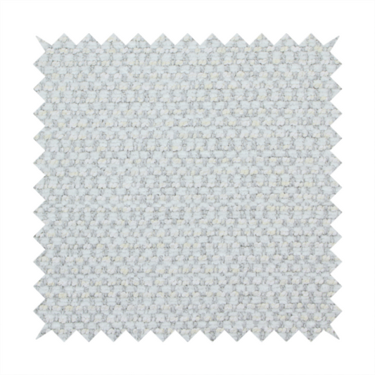 The material features a dense, multi-toned neutral weave with a pale grey and silver-toned base, intricately interlaced with horizontal flecks of soft cream and off-white threads throughout.