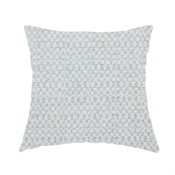 The fabric used to create this handmade cushion is a material features a dense, multi-toned neutral weave with a pale grey and silver-toned base, intricately interlaced with horizontal flecks of soft cream and off-white threads throughout.