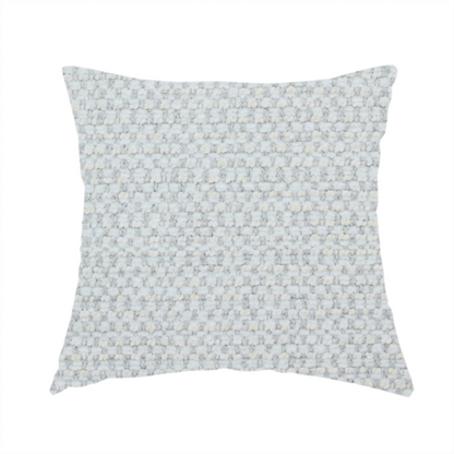 The fabric used to create this handmade cushion is a material features a dense, multi-toned neutral weave with a pale grey and silver-toned base, intricately interlaced with horizontal flecks of soft cream and off-white threads throughout.