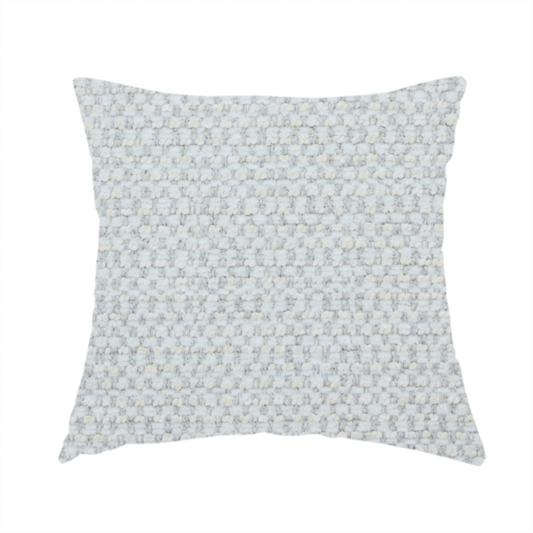 The fabric used to create this handmade cushion is a material features a dense, multi-toned neutral weave with a pale grey and silver-toned base, intricately interlaced with horizontal flecks of soft cream and off-white threads throughout.