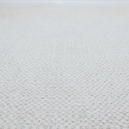 The material features a dense, multi-toned neutral weave with a pale grey and silver-toned base, intricately interlaced with horizontal flecks of soft cream and off-white threads throughout.