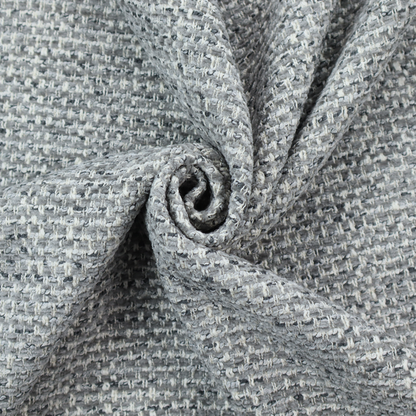 The material features a dense, multi-toned weave with a mid-grey base, intricately interlaced with horizontal flecks of crisp white and dark charcoal grey threads throughout.