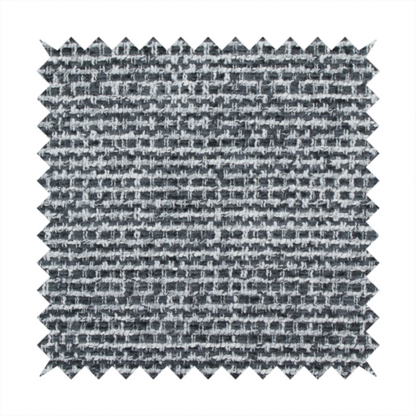 The material features a dense, multi-toned weave with a dark charcoal grey and slate base, intricately interlaced with prominent horizontal flecks of crisp white and lighter grey threads throughout.
