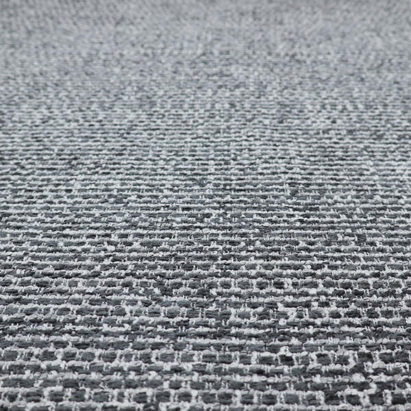 The material features a dense, multi-toned weave with a dark charcoal grey and slate base, intricately interlaced with prominent horizontal flecks of crisp white and lighter grey threads throughout.