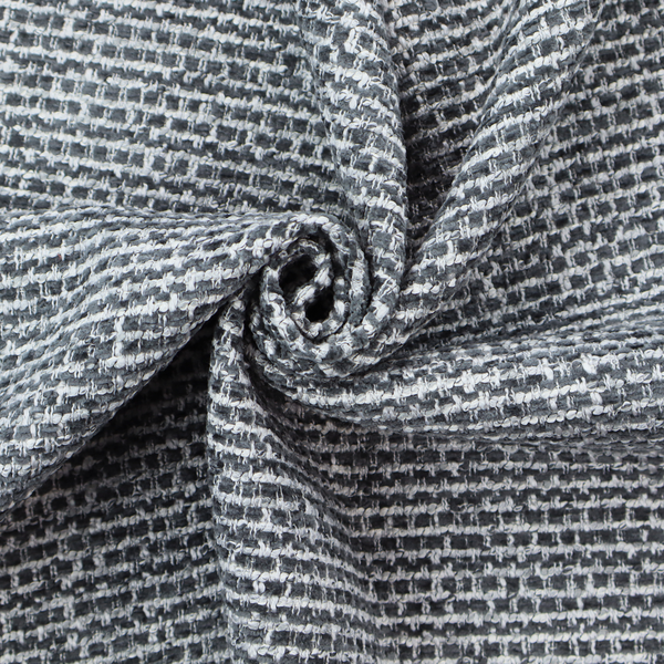 The material features a dense, multi-toned weave with a dark charcoal grey and slate base, intricately interlaced with prominent horizontal flecks of crisp white and lighter grey threads throughout.