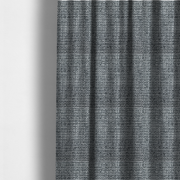 The fabric used to create these curtains is a material features a dense, multi-toned weave with a dark charcoal grey and slate base, intricately interlaced with prominent horizontal flecks of crisp white and lighter grey threads throughout.