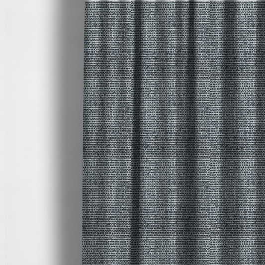 The fabric used to create these curtains is a material features a dense, multi-toned weave with a dark charcoal grey and slate base, intricately interlaced with prominent horizontal flecks of crisp white and lighter grey threads throughout.