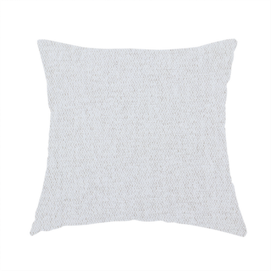 The fabric used to create this handmade cushion is a light grey or off-white woven fabric with a fine, textured basket weave pattern.
