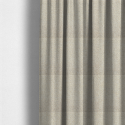The fabric used to create these made-to-measure curtains is a beige or oatmeal woven fabric with a fine, textured basket weave pattern.