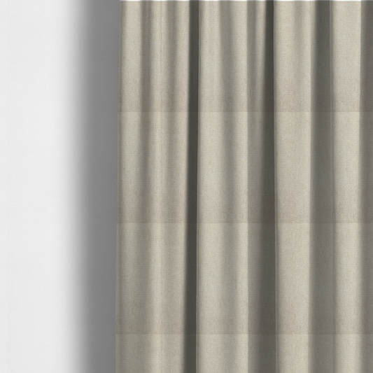 The fabric used to create these made-to-measure curtains is a beige or oatmeal woven fabric with a fine, textured basket weave pattern.