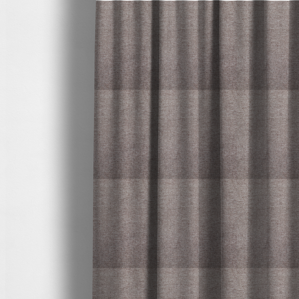 The fabric used to create these made-to-measure curtains is a mocha brown or mink-coloured woven fabric with a fine, heathered texture.