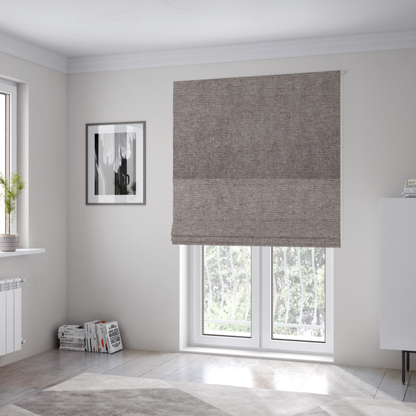 The fabric used to create these Roman blinds is a mocha brown or mink-coloured woven fabric with a fine, heathered texture.