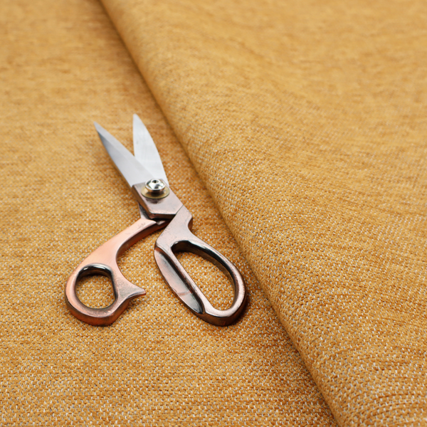 A vibrant mustard yellow woven fabric with a fine, heathered texture.