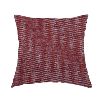 The fabric used to create this handmade cushion is a rich burgundy red woven fabric with a fine, heathered texture.